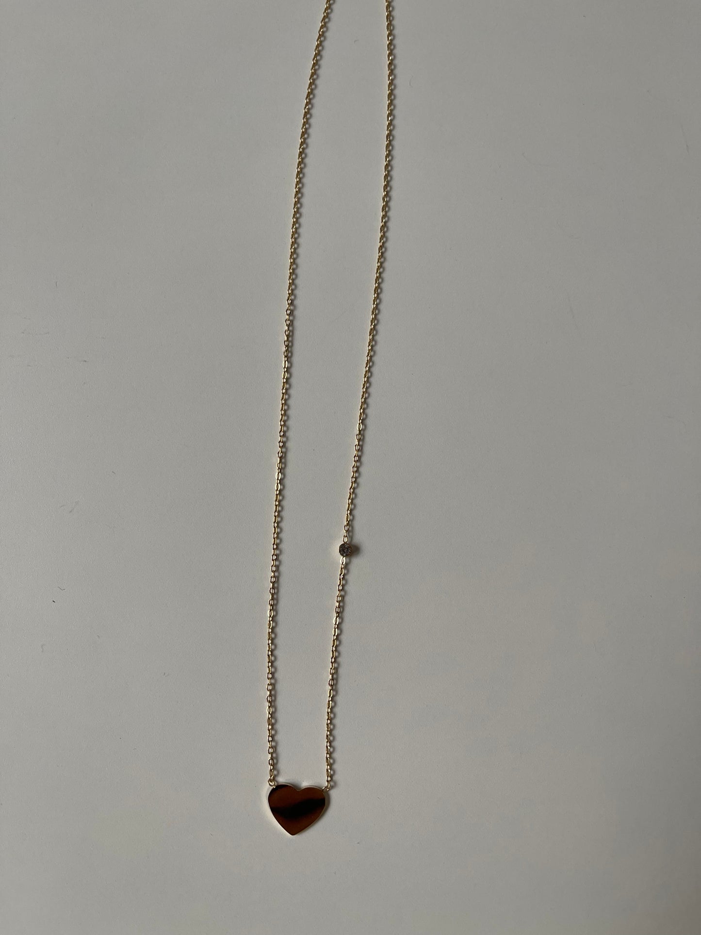 Collier à petit cœur doré