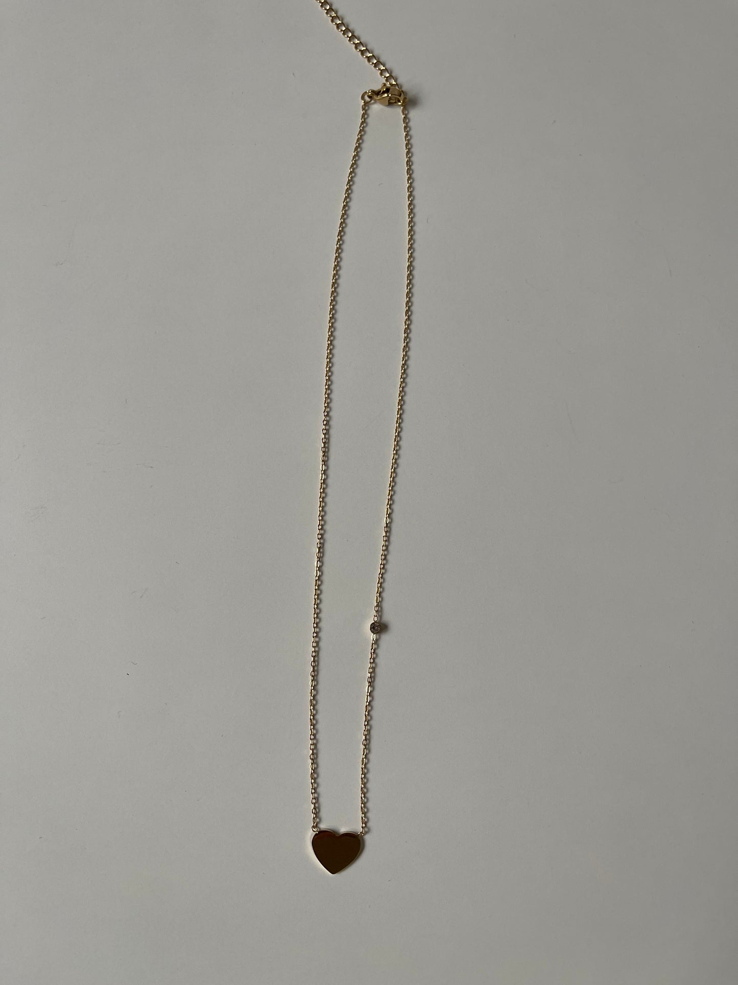 Collier à petit cœur doré